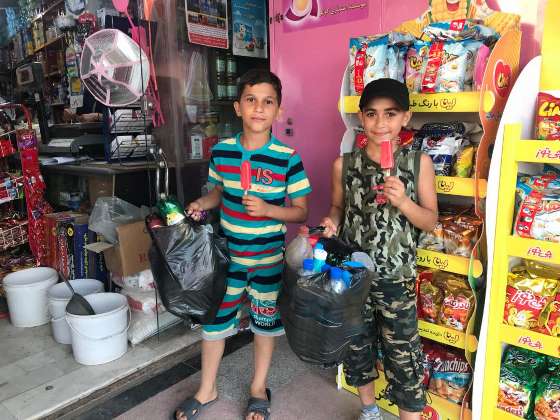The Supermarket gathers plastic bottles from children and give them an ice-cream in return