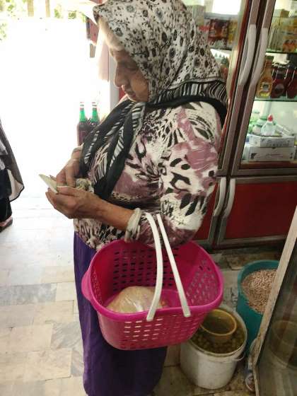 This woman use bag called Zanbil instead of asking for a plastic bag